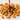 Maní confitado cubierto con chocolate con leche, imagen decorativa utilizada en la tienda online mysuplify en Chile para representar mezcla crujiente y dulce.